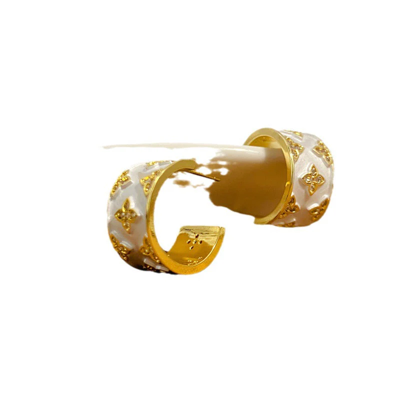 FOUR-LEAF CLOVER EARRINGS + RINGS - Image 4
