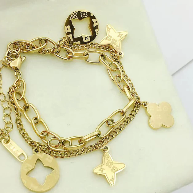 FOUR LEAF CLOVER CHARMS BRACELET - GOLD AND SILVER - Image 10