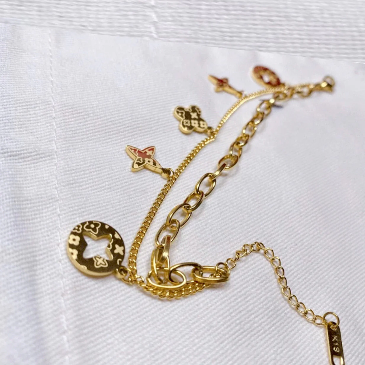 FOUR LEAF CLOVER CHARMS BRACELET - GOLD AND SILVER - Image 2