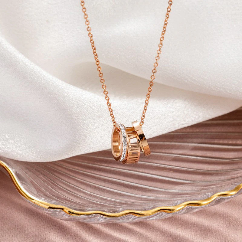 Rose Gold Roman Numeral Triple Ring Necklace - Image 3
